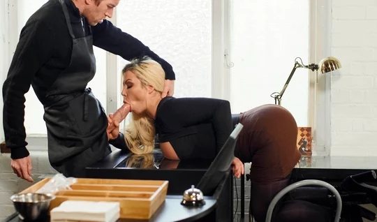 Sexy blonde sucks a guys big cock in a coffee shop