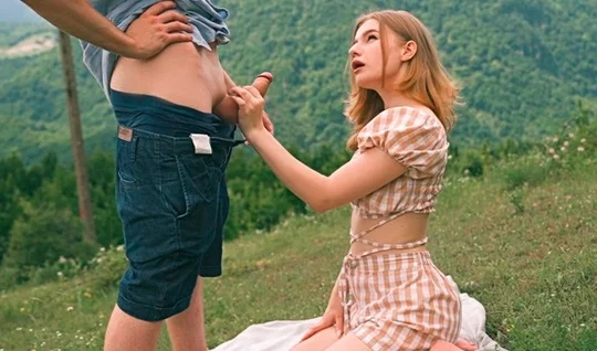 Russian chick tries a guys penis right in nature